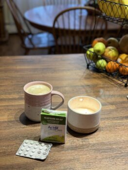 Boiron Acidil with a cup of coffee